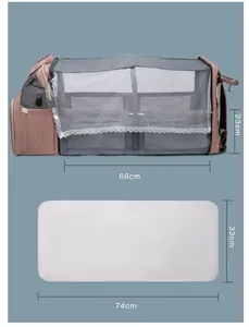 Detailed size chart showing the unfolded diaper bag crib with dimensions in centimeters