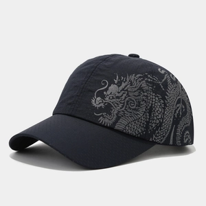 Detail of grey baseball cap with dragon print and breathable mesh fabric texture