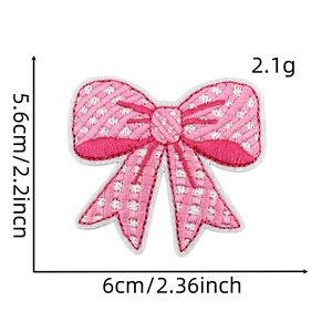 Detailed close-up of pink plaid embroidered bow patch with clear size measurements