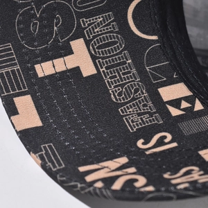 Close-up of graffiti print baseball cap showing durable fabric and precise stitching