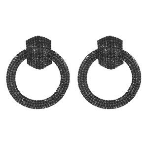 Detailed view of black rhinestone hoop earrings with hexagonal stud and crystals