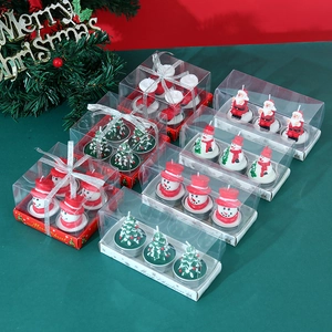 Christmas candle gift sets featuring Santa, Snowman, and Tree shapes in PVC packaging