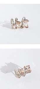 Macro detail of three silver ear cuffs set with rectangular champagne cubic zirconia stones