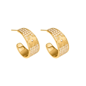 Golden C-shaped hoop earrings with floral relief and sparkling zircon inlay