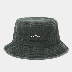 Detail of dark grey washed denim bucket hat with white mountain embroidery and vent holes