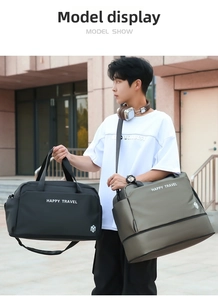 Outdoor model display of large travel bag with Happy Travel text in black and green