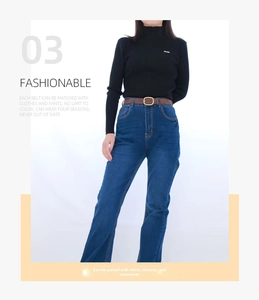 Brown suede belt with golden oval buckle shown on denim jeans for a stylish casual look