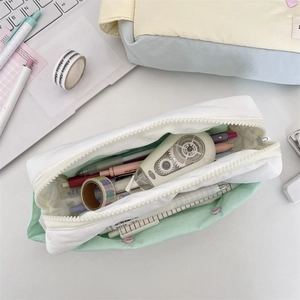 Top view of large capacity pencil case with fresh green and white patchwork design