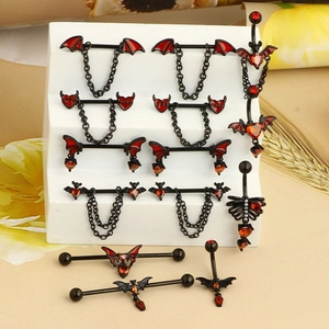 Gothic black steel body piercing jewelry with bat wings and red zircon stones