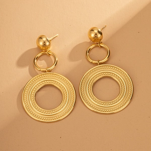 Three-tier gold-plated titanium steel hoop earrings with textured round tassels