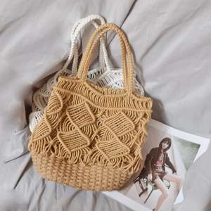 Handmade hollow macrame tote bag in camel and off-white woven cotton rope