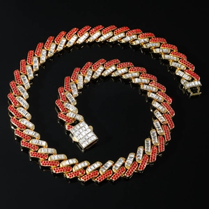 15mm gold Cuban link necklace with alternating red and clear crystals on black surface