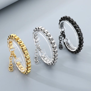 Bracelet pour homme en acier inoxydable style maille de montre, coloris or et noir