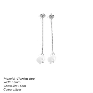 Detail view of long stainless steel silver drop earrings with 5cm chain and 8mm pearls