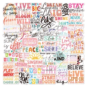 Close-up of 50pcs colorful vinyl motivational quote stickers for laptops and water bottles