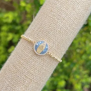18K gold plated rope chain bracelet featuring a Virgin Mary pendant with cubic zirconia