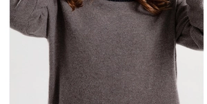 Close-up of dark brown knitted winter set showing thick thermal ribbed texture and material