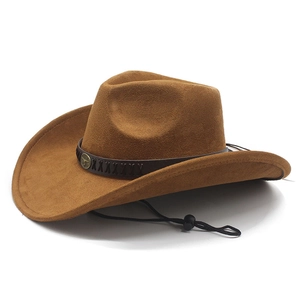 Detail of brown faux suede cowboy hat with vintage metal bull head and leather band