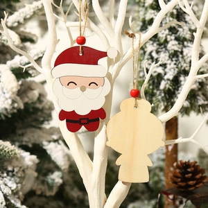 Christmas wooden Santa Claus pendant hanging on art branch with festive background