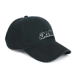 Black cotton baseball cap with white embroidered Deutse logo shown at a 45-degree angle