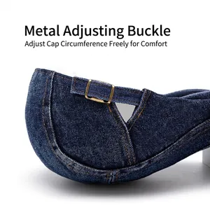Adjustable washed denim flat cap with bronze metal buckle and contrast stitching