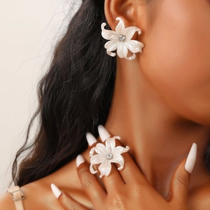 Elegant white camellia flower stud earrings and ring set with pearl luster and crystals