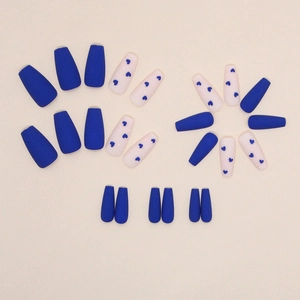 Long coffin ocean blue matte press-on nails with heart patterns and nude base
