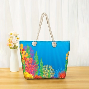 Large beach tote bag with colorful coral reef print and sturdy cotton rope handles