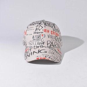 Detailed view of the off-white canvas baseball cap with black and red graffiti print