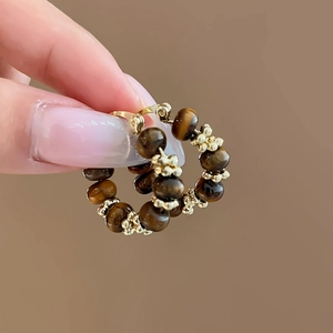 Retro geometric hoop earrings with gold metal and glossy brown leopard pattern beads