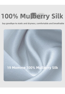 Detail view of 100% mulberry silk fabric in 19 momme silver-grey with soft silk texture