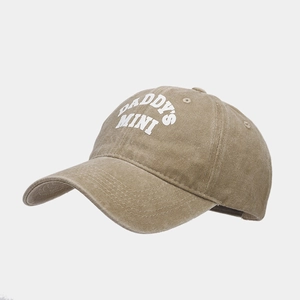Close-up of khaki cotton baseball cap with Daddy's Mini heat transfer lettering