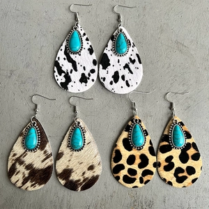 Western animal print leather teardrop earrings with turquoise studs and cow patterns