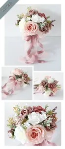 Detail of dusty rose bridal bouquet with silk roses and long decorative ribbons