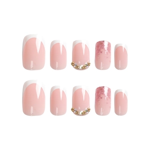 Elegant French pink and white press-on nails with glitter and rhinestone accents