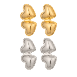 Minimalist gold and silver heart-shaped stud earrings with polished finish on white background