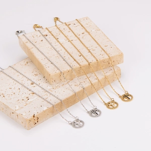 Minimalist stainless steel necklaces with hollow round cross pendants in gold and silver
