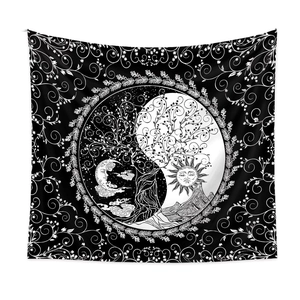Detailed view of bohemian Yin Yang tree of life tapestry with sun and moon motifs
