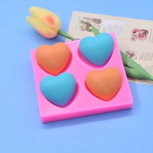 Pink heart-shaped silicone mold for handmade soaps and aromatherapy candles