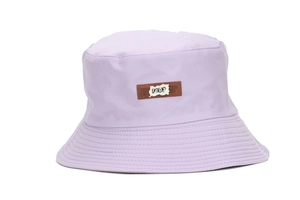 Detail of light purple bucket hat with embroidered 1203 patch and reinforced stitching