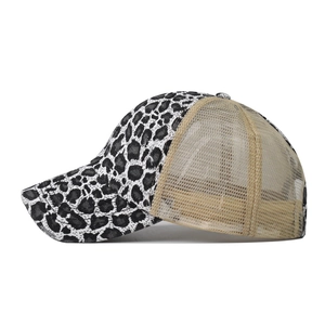 Detail of washed leopard print baseball cap featuring breathable mesh back and side view