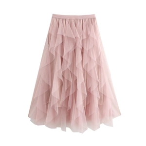 Detail view of pink layered mesh skirt featuring lightweight irregular ruffle hem design