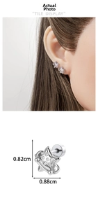 Macro detail of star-shaped zircon stud earring with dimension measurements and model view