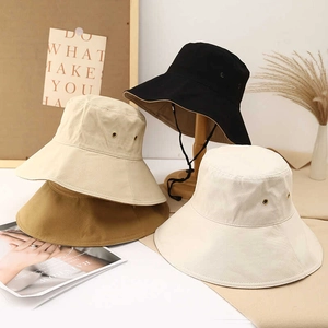 Outdoor sun hats in black, beige, khaki, and white shown with adjustable chin cords