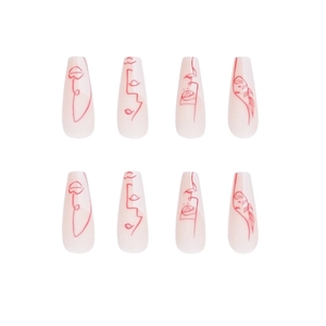 Artistic abstract face line press-on nails in pink with medium coffin shape design
