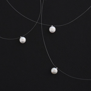 Single natural pearl invisible fish line necklace with silver titanium steel fittings