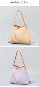 Detail view of woven straw tote bags in beige and light purple with leather handles