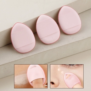 Pink teardrop makeup puff set with finger straps for precise foundation and concealer application