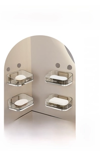 Detail of wall-mounted smoke gray soap holders with drainage and metallic base