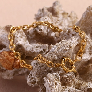 18K gold plated stainless steel chain bracelet with a natural conch shell and OT toggle clasp